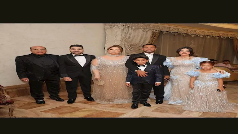 "مع أبنائهم".. 9 صور لوليد سليمان وزوجته في إحدى المناسبات 1 "مع أبنائهم".. 9 صور لوليد سليمان وزوجته في إحدى المناسبات